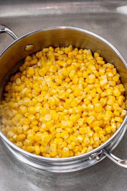Draining the frozen corn in a colander