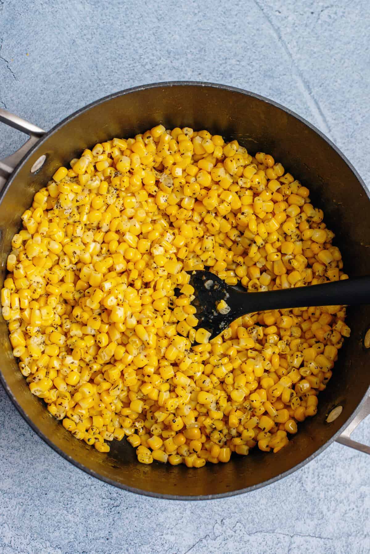 Tossing the frozen corn in with the butter sauce