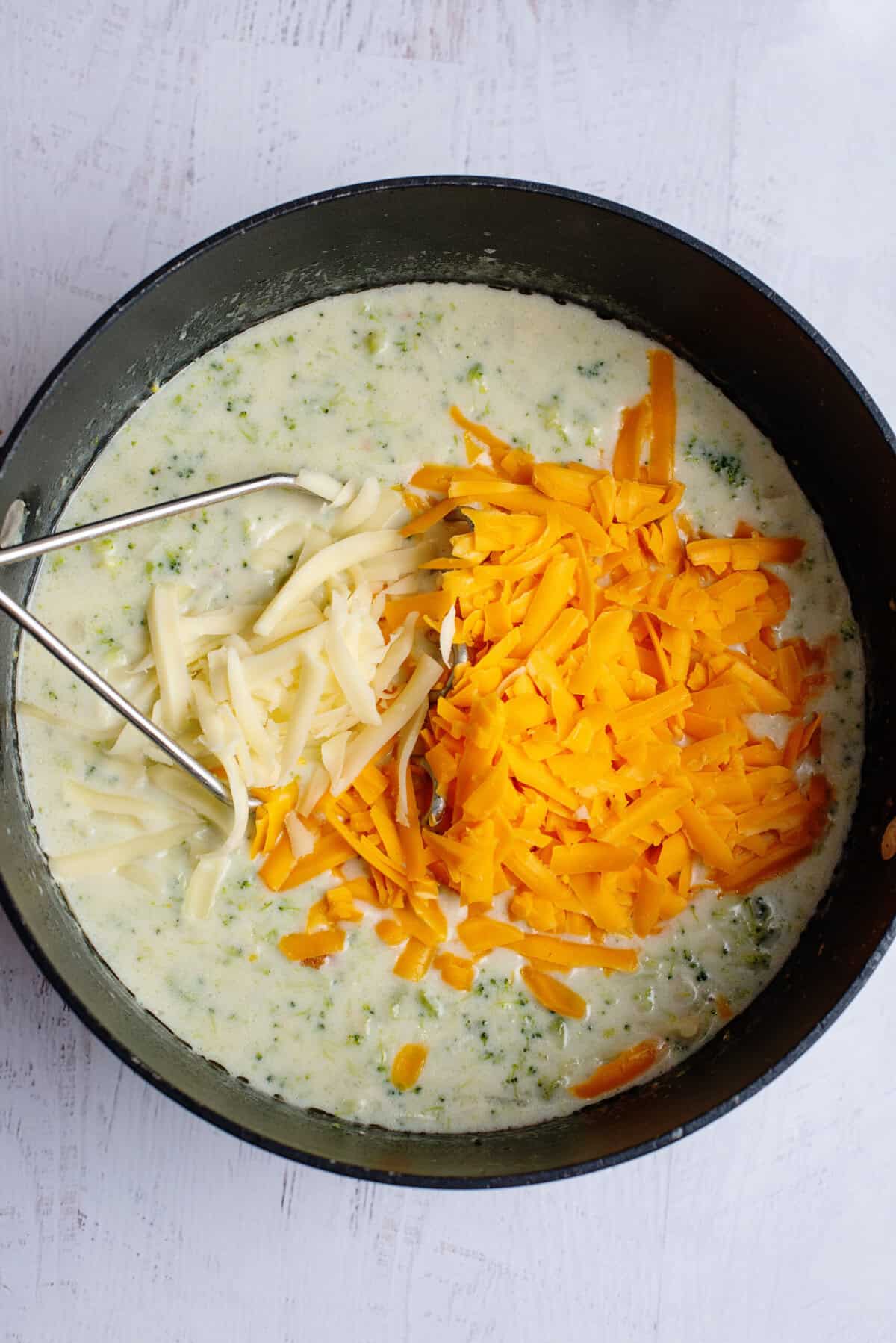 Adding cheddar to Broccoli Cheese and Bacon Soup