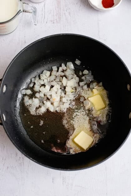 Cooking diced onion in a pan