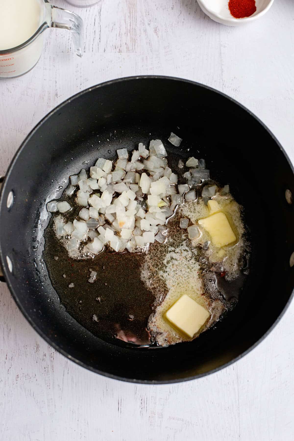 Cooking diced onion in a pan