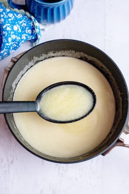 A pot of buttermilk syrup with a ladel