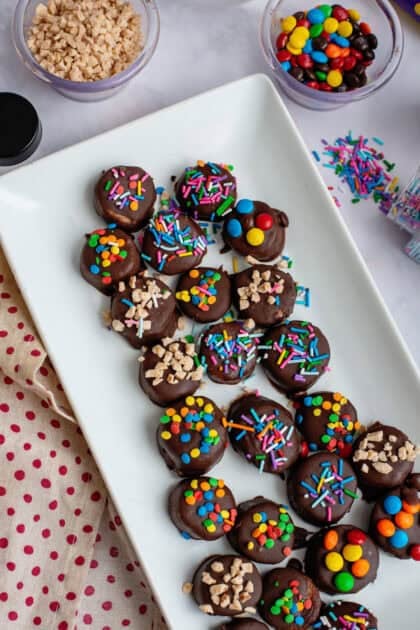 A plate of chocolate covered banana slices