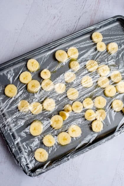 Banana slices on a baking sheet