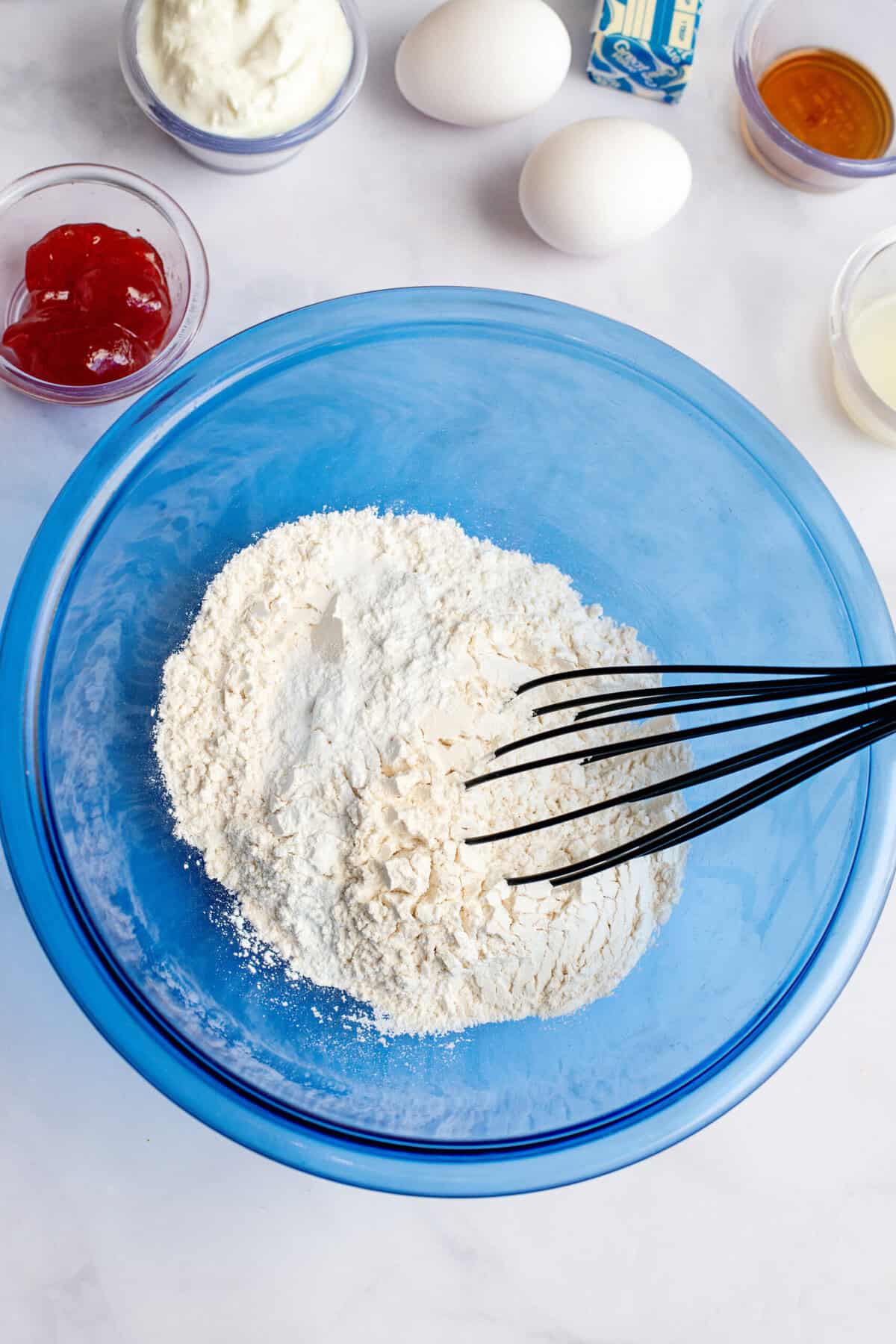 flour, baking powder, baking soda, and salt in a mixing bowl