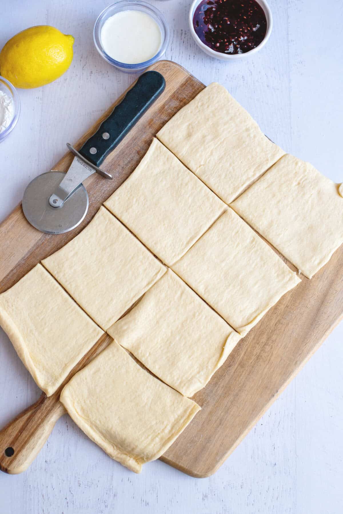 Cut squares of crescent roll dough