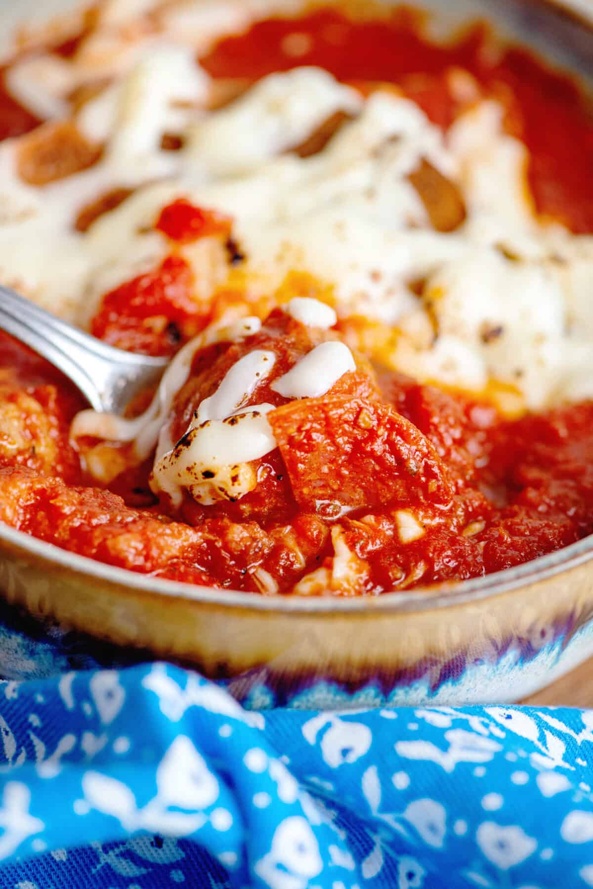 Side view of a bowl of pizza soup