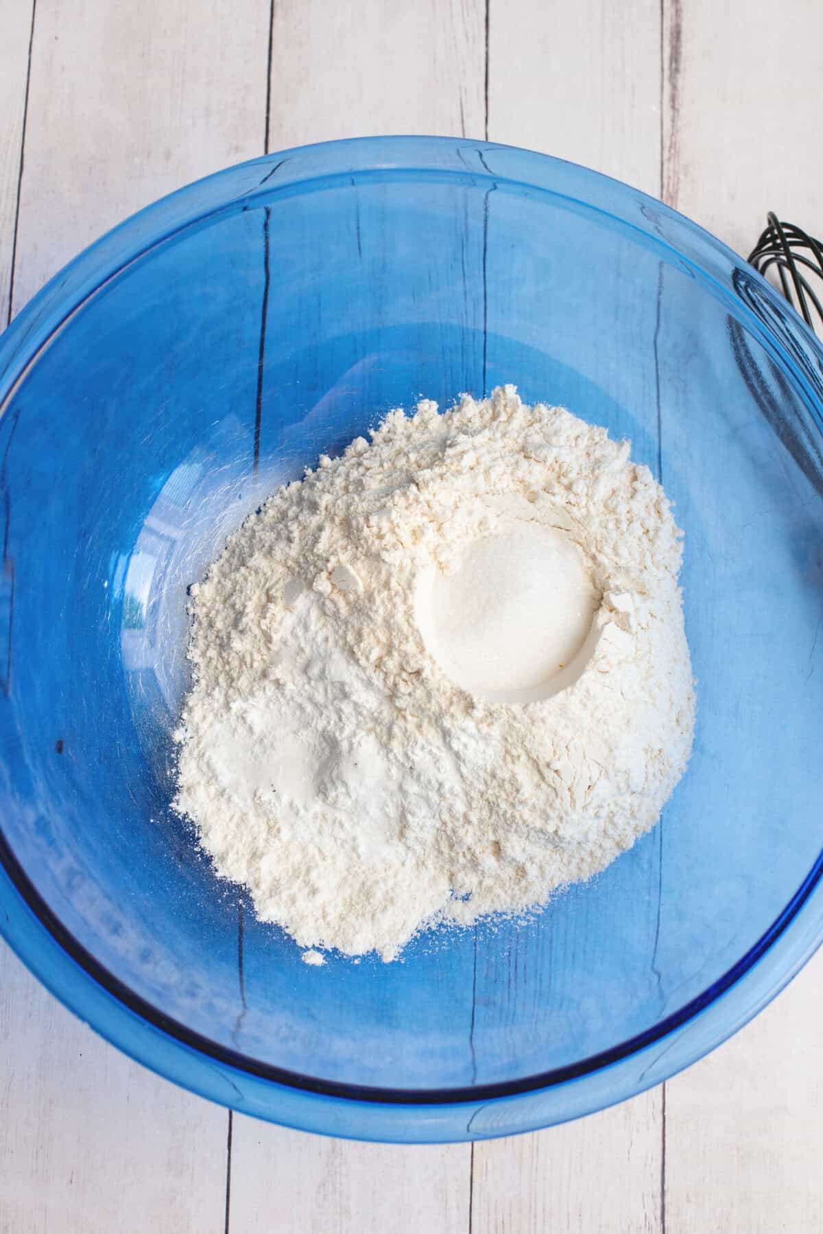 Dry ingredients for cathead biscuits in a small mixing bowl