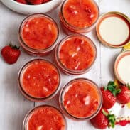 Mason jars of easy strawberry freezer jam
