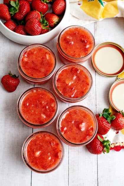 Mason jars of easy strawberry freezer jam