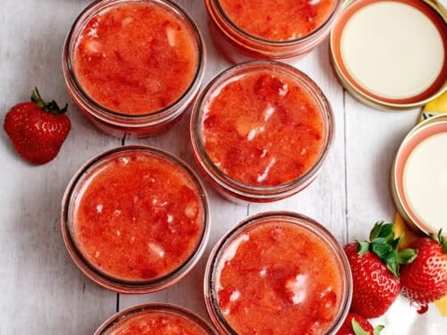 Mason jars of easy strawberry freezer jam