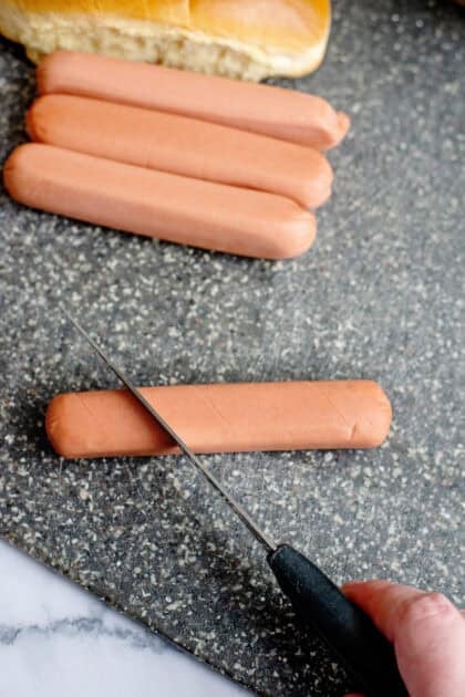 Scoring a raw hot dog