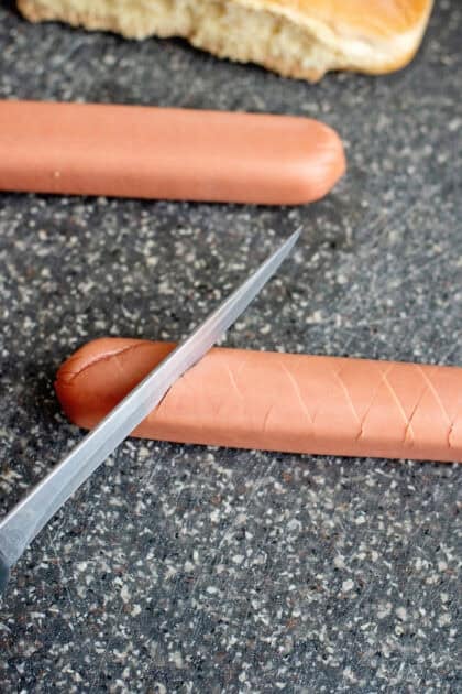 A scored hot dog