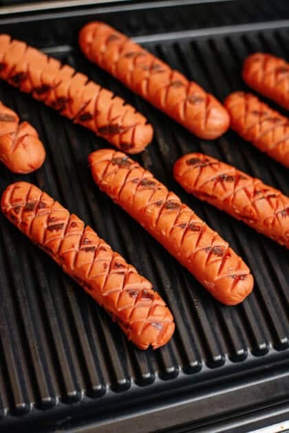 Hot dogs on a grill