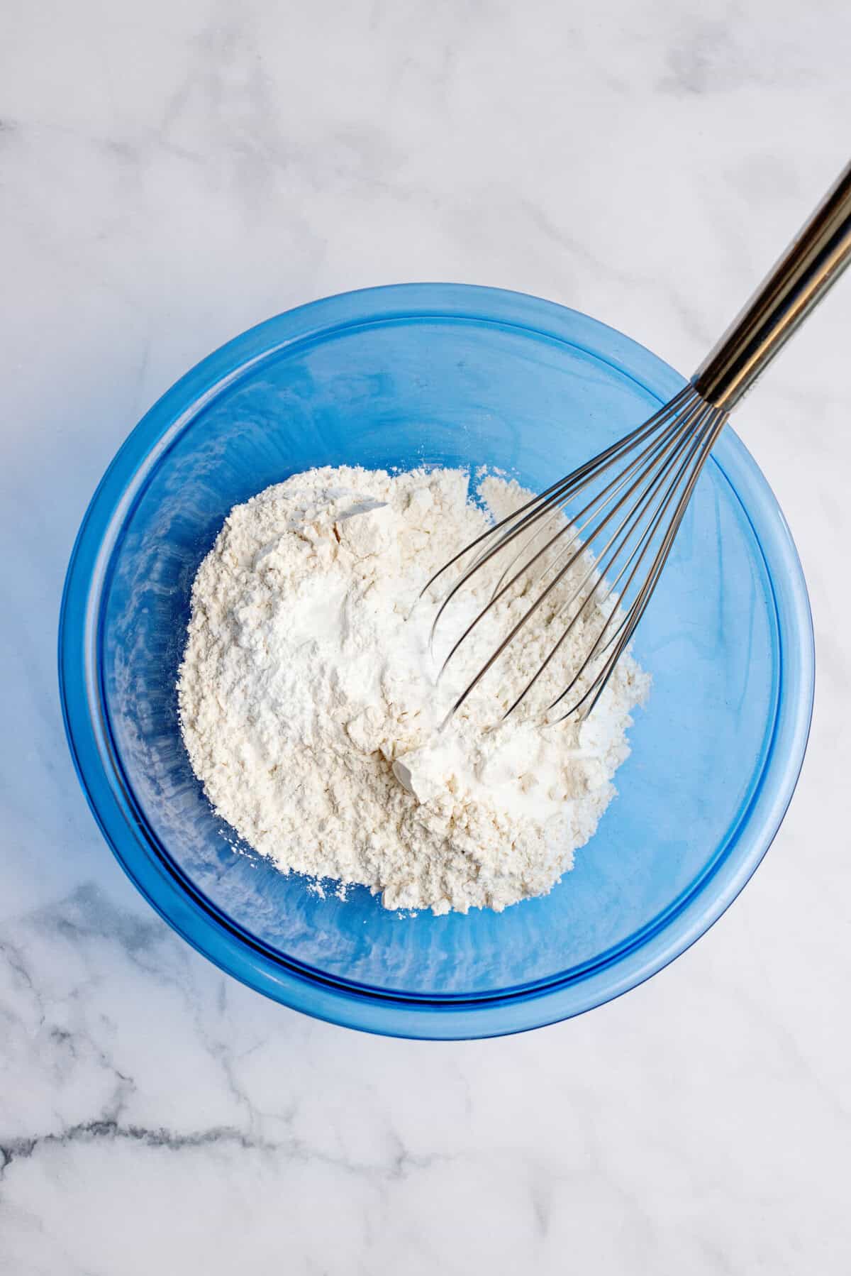 Blueberry coffee cake dry ingredients in a mixing bowl