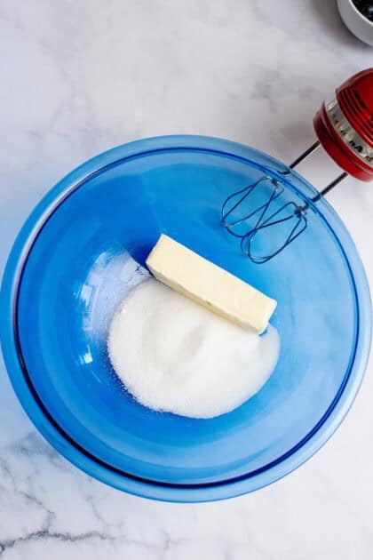 Softened butter added to the bowl of dry ingredients