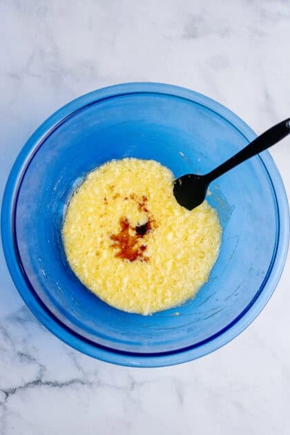 Combining the dry and wet ingredients in a mixing bowl