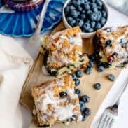 Blueberry coffee cake squares on a cutting board