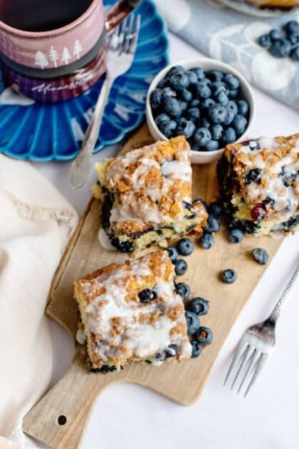 Blueberry coffee cake squares on a cutting board