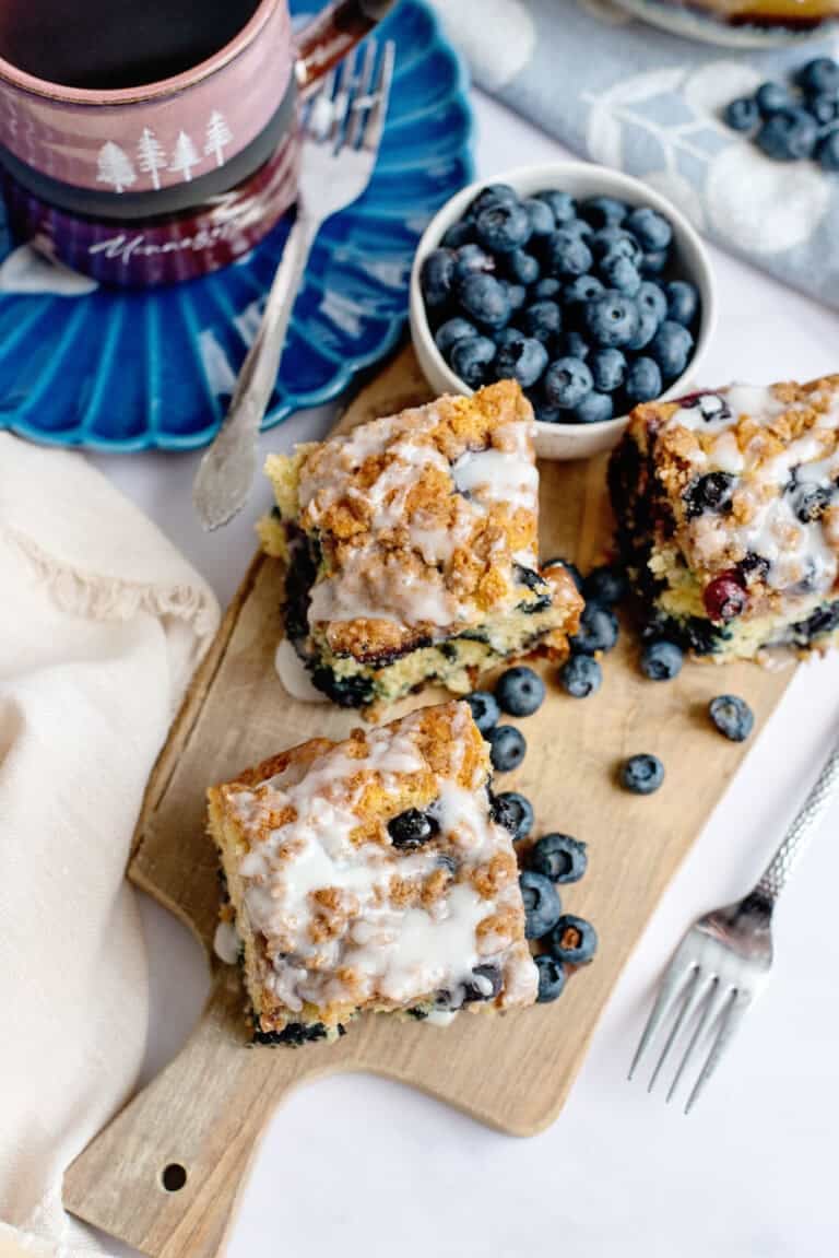 Blueberry coffee cake squares on a cutting board