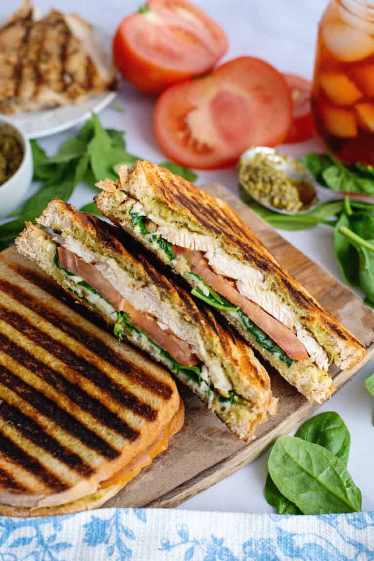 Chicken pesto paninis on a cutting board