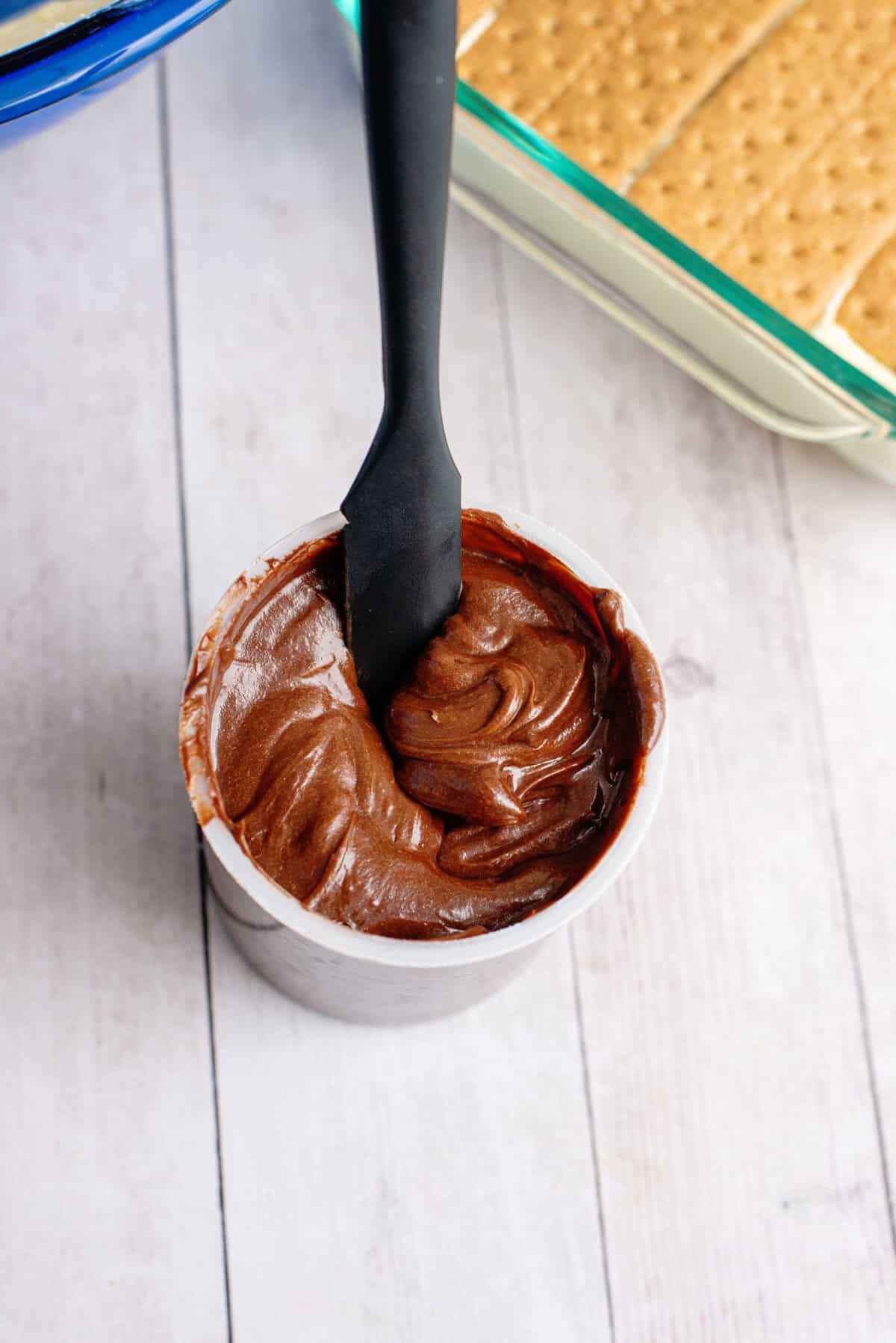 A bowl of chocolate topping