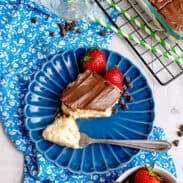 Top view of a slice of chocolate eclaire cake on a plate