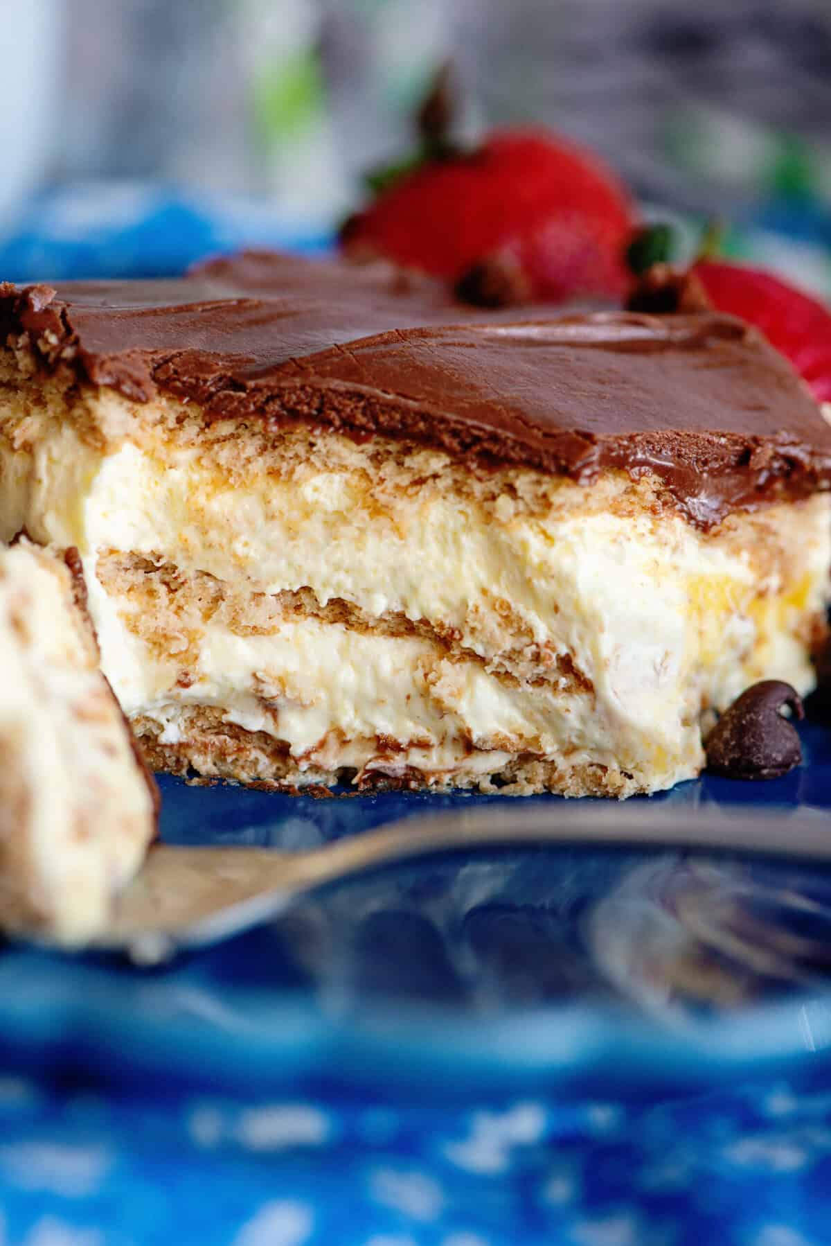 Side view of a slice of Chocolate Eclair Ice Box Cake