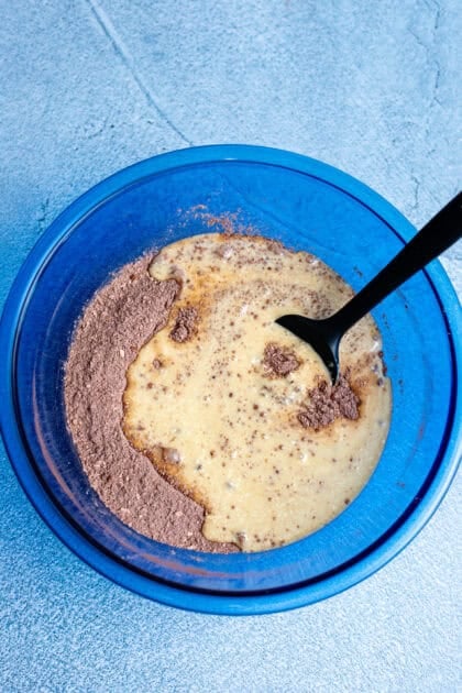 creamy cottage cheese mixture and the dry ingredients mixed in a bowl