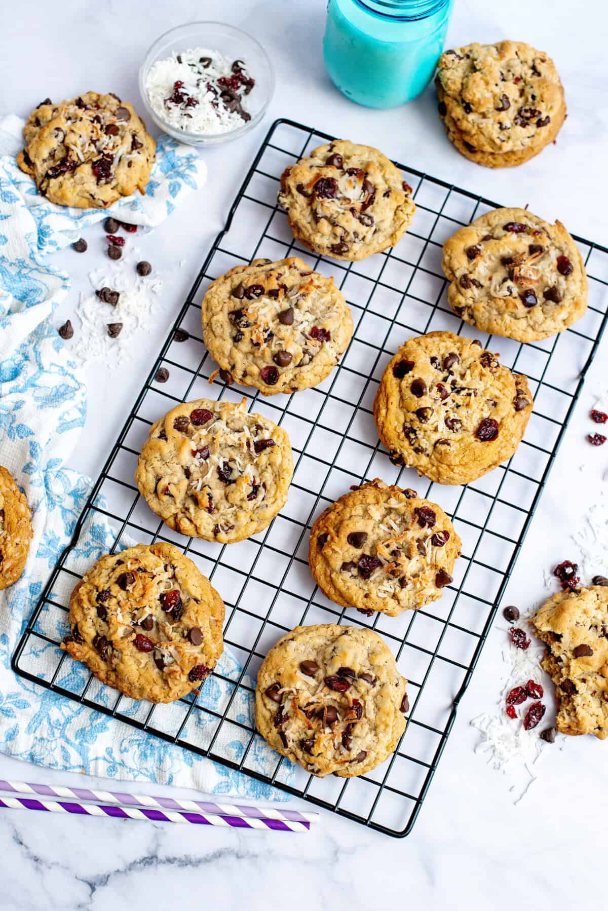 Baked chocolate chip oatmeal cookies cooling on a wire rack