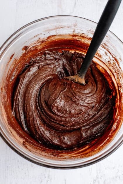 Stirred brownie batter in a mixing bowl