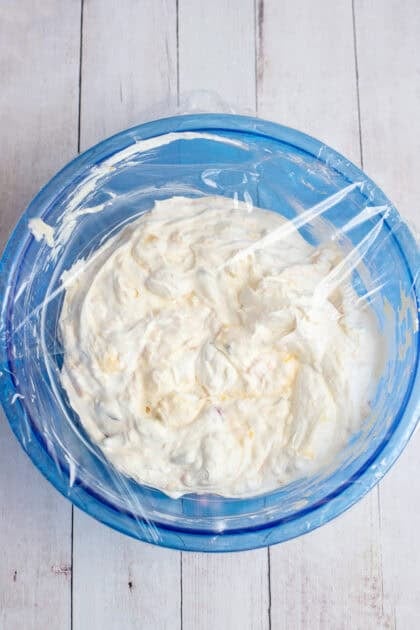 a bowl of Whoa Horsey salad covered with cling wrap