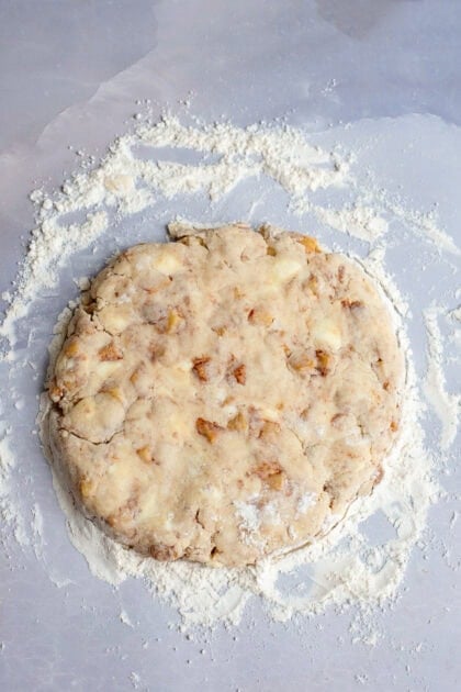 A flat circle of scone dough.