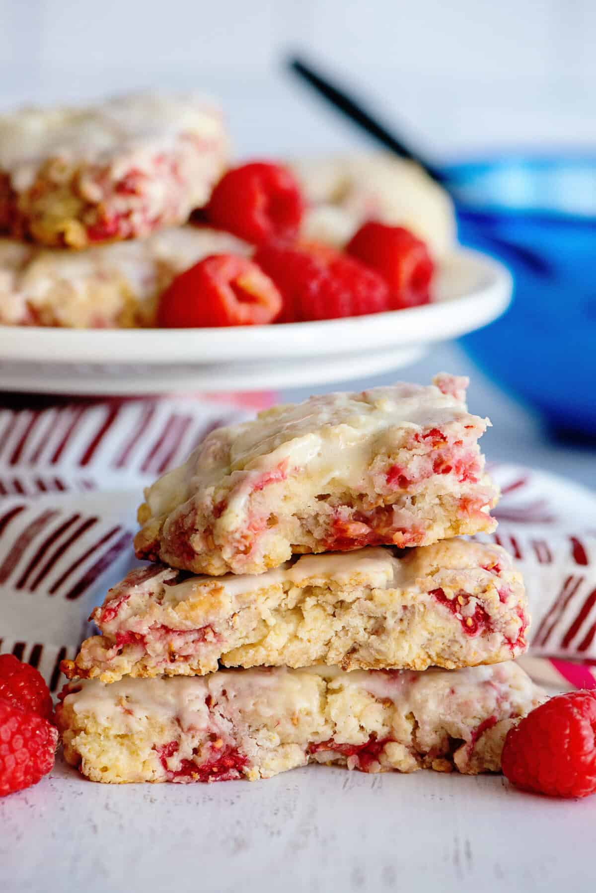 A stack of raspberry scones showing its crumbly texture.