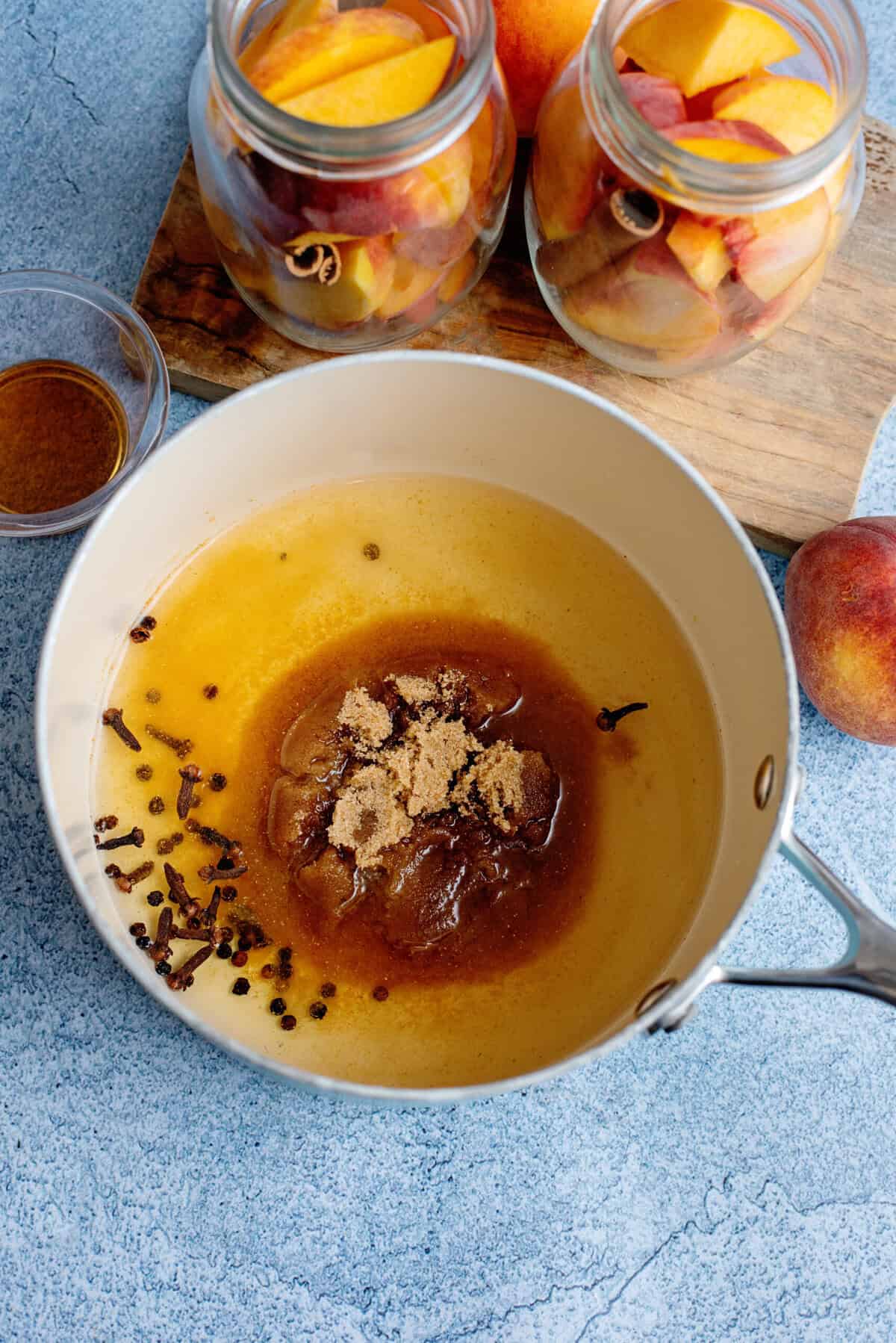 Apple cider vinegar, brown sugar, and spices in a sauce pan.
