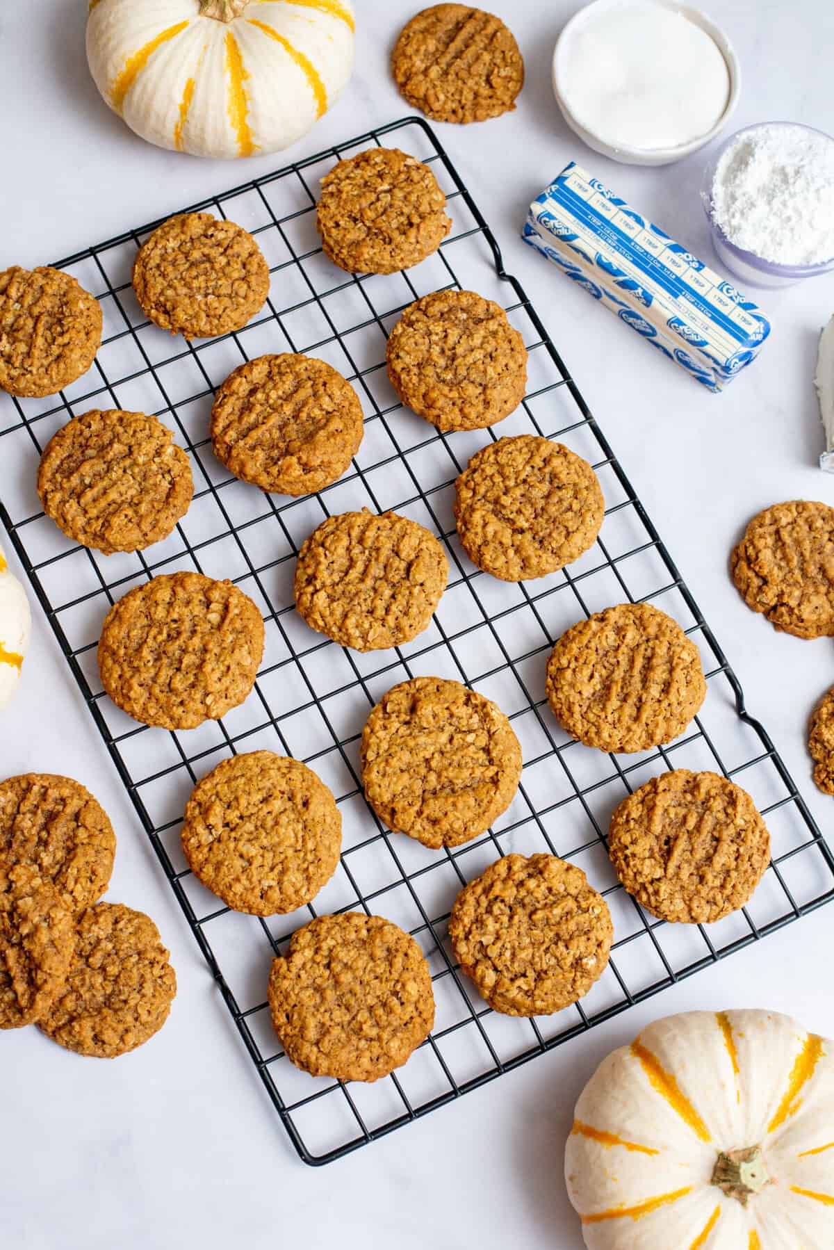 Pumkin oatmeal cookies on a cooling rack.