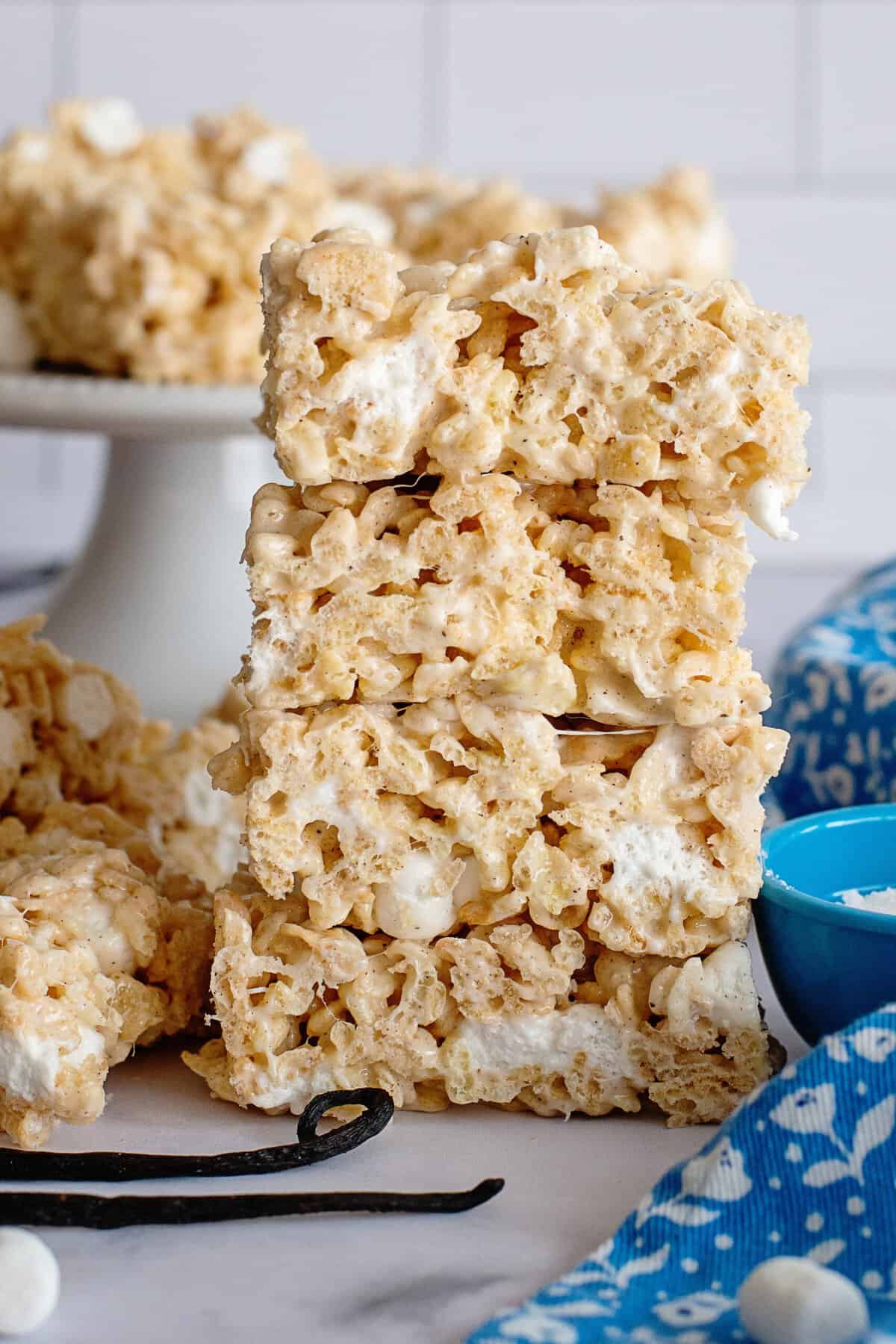 A stack of four brown butter sea salt Rice Krispie treats.