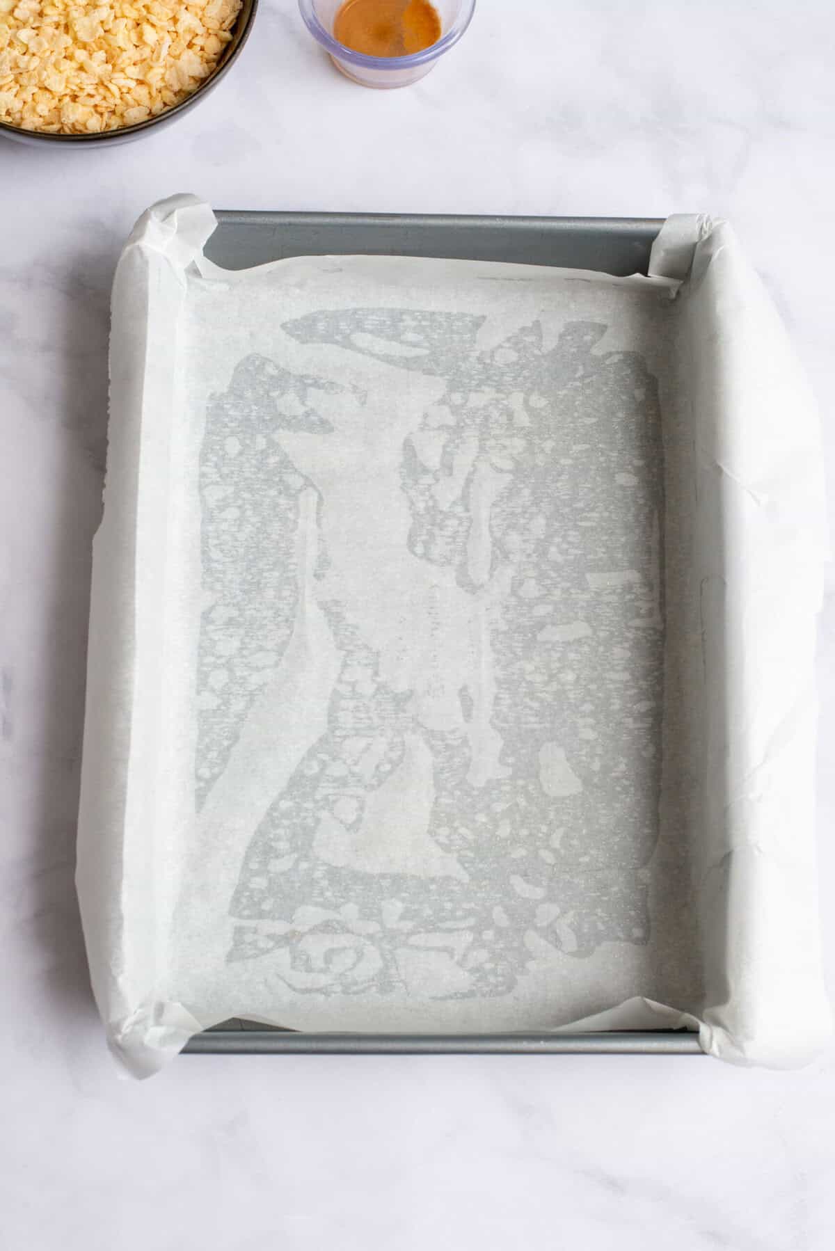 A parchment lined baking sheet.
