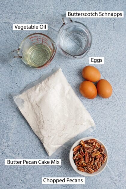 Labeled ingredients for butter pecan muffins: butter pecan cake mix, eggs, vegetable oil, butterscotch schnapps, and chopped pecans