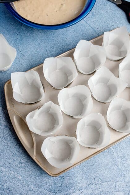 Muffin tin lined with parchment tulip liners