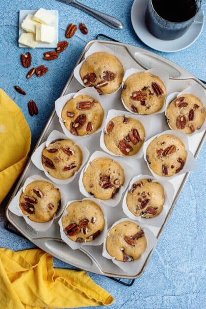 Baked butter pecan muffins in a muffin tin