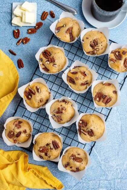 Butter pecan muffins cooling on a wire rack