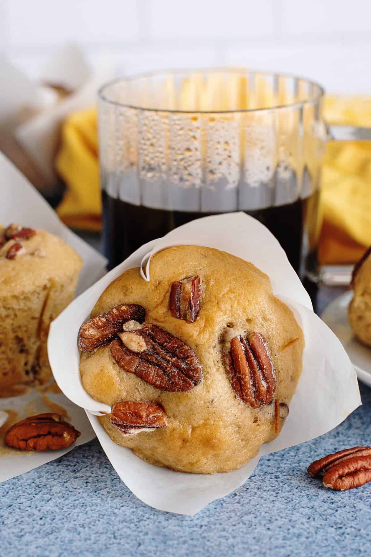 Butter pecan muffin with a cup of coffee
